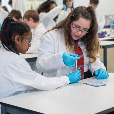 Two girls carry out an experiment in a lab in Southampton