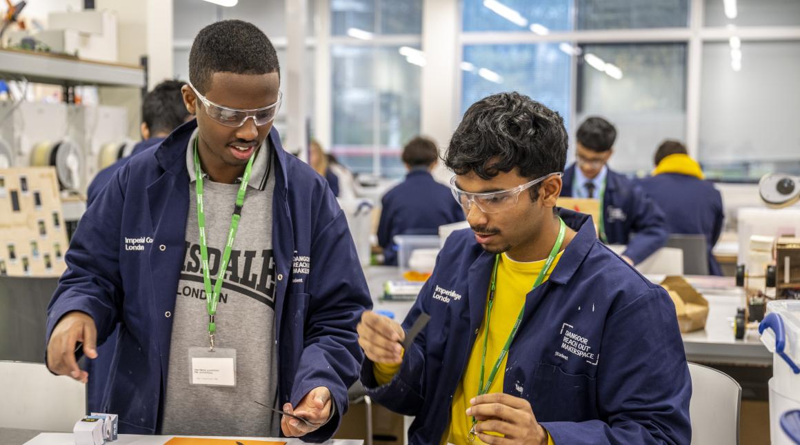 Two young men in the workshop during the Maker Challenge at the Invention Rooms