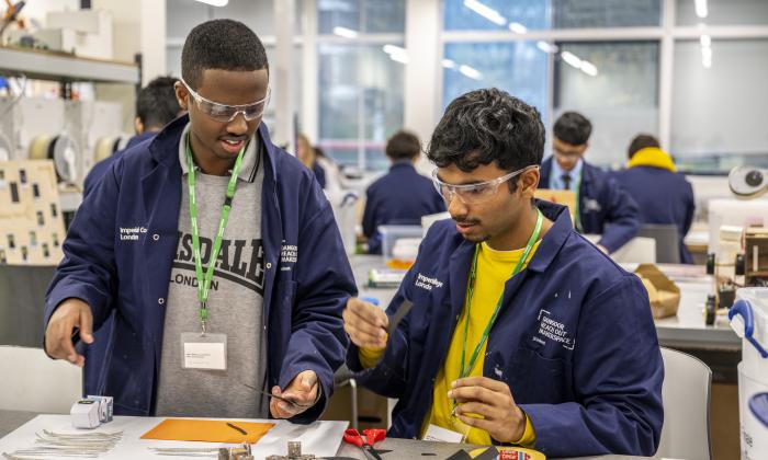 Two young men in the workshop during the Maker Challenge at the Invention Rooms