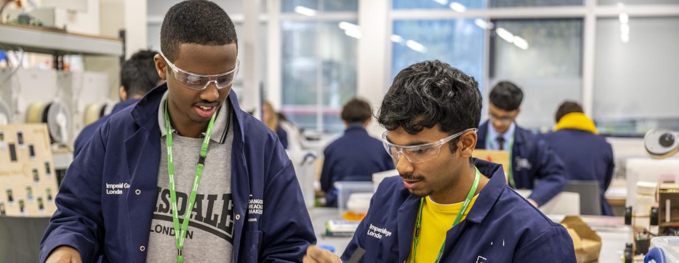 Two young men in the workshop during the Maker Challenge at the Invention Rooms