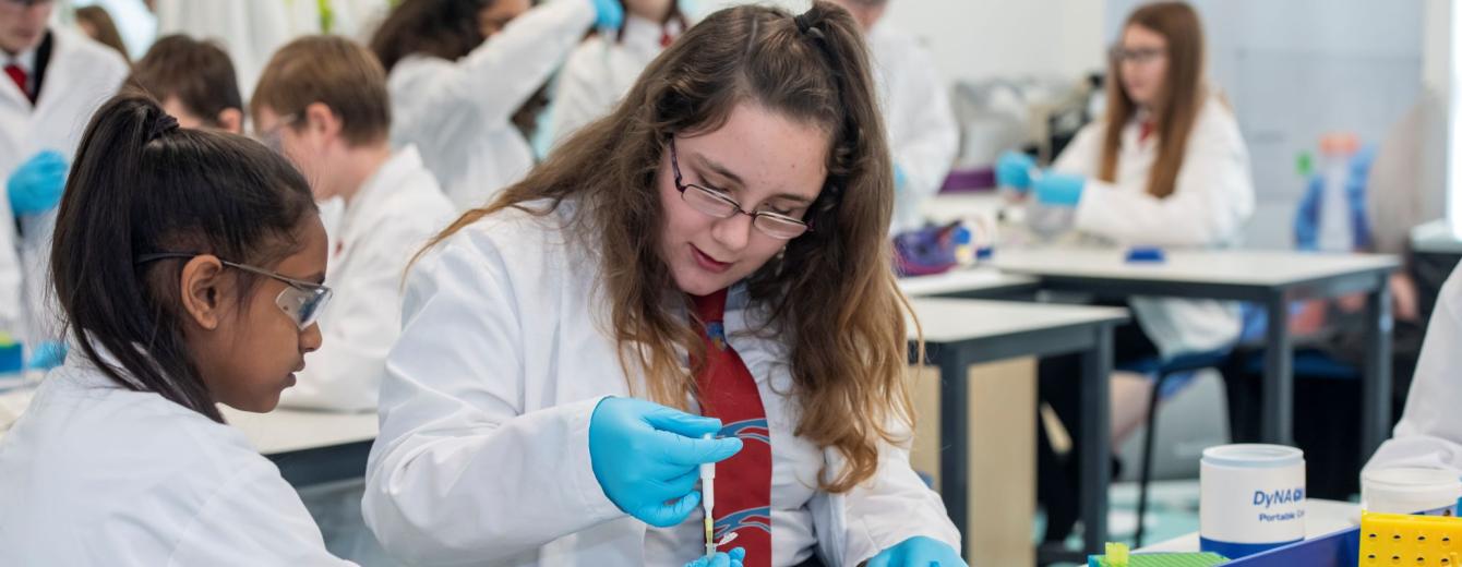 Two girls carry out an experiment in a lab in Southampton