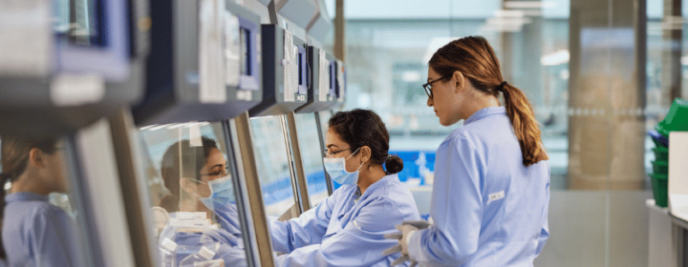 Two female researchers work in a laboratory at Autolus