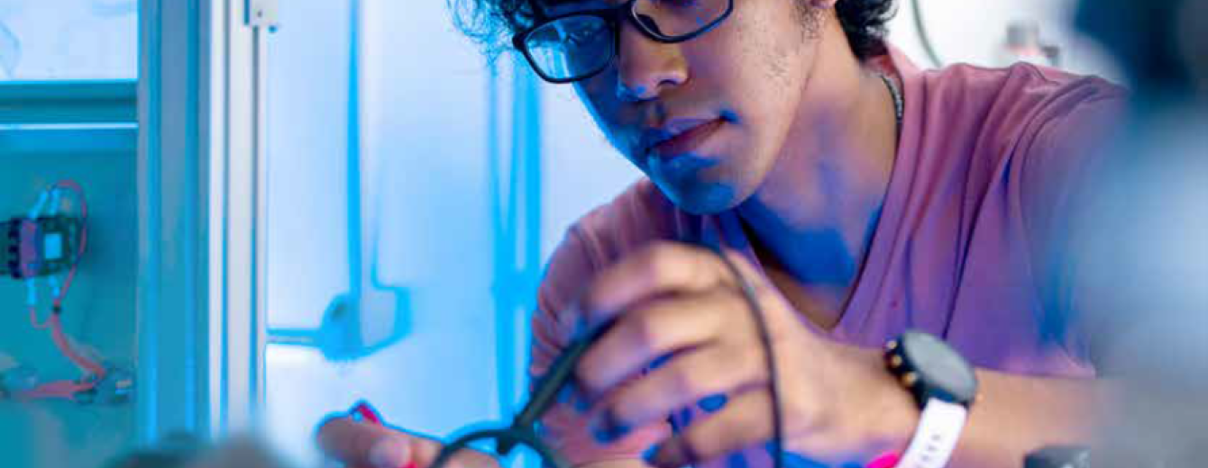 A student works in an electronics lab 